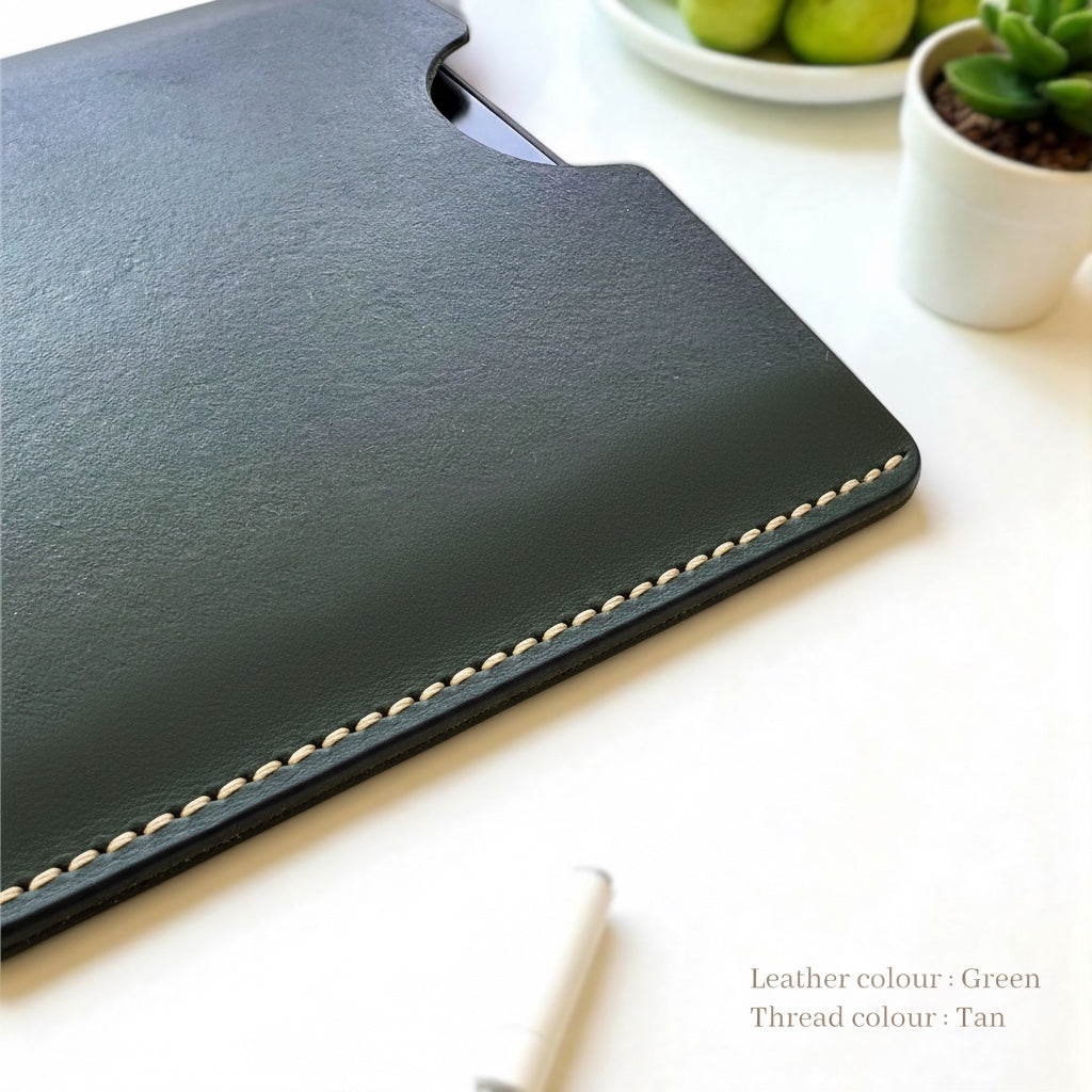 Azzohandmade green full grain leather sleeve for Kobo e-readers, hand-stitched with tan thread. Slim, protective case.