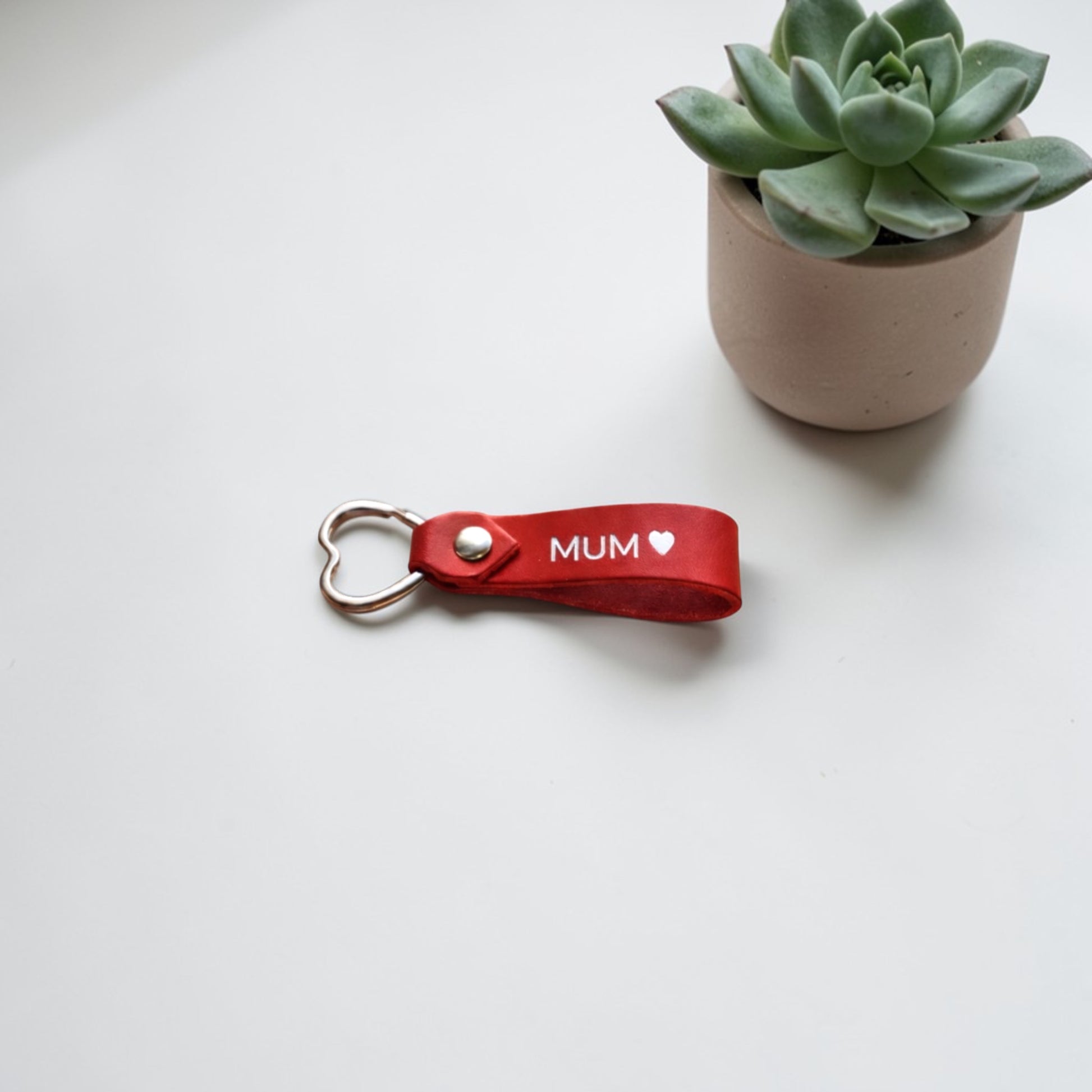 Handmade personalised leather keyring with engraved Mum and heart