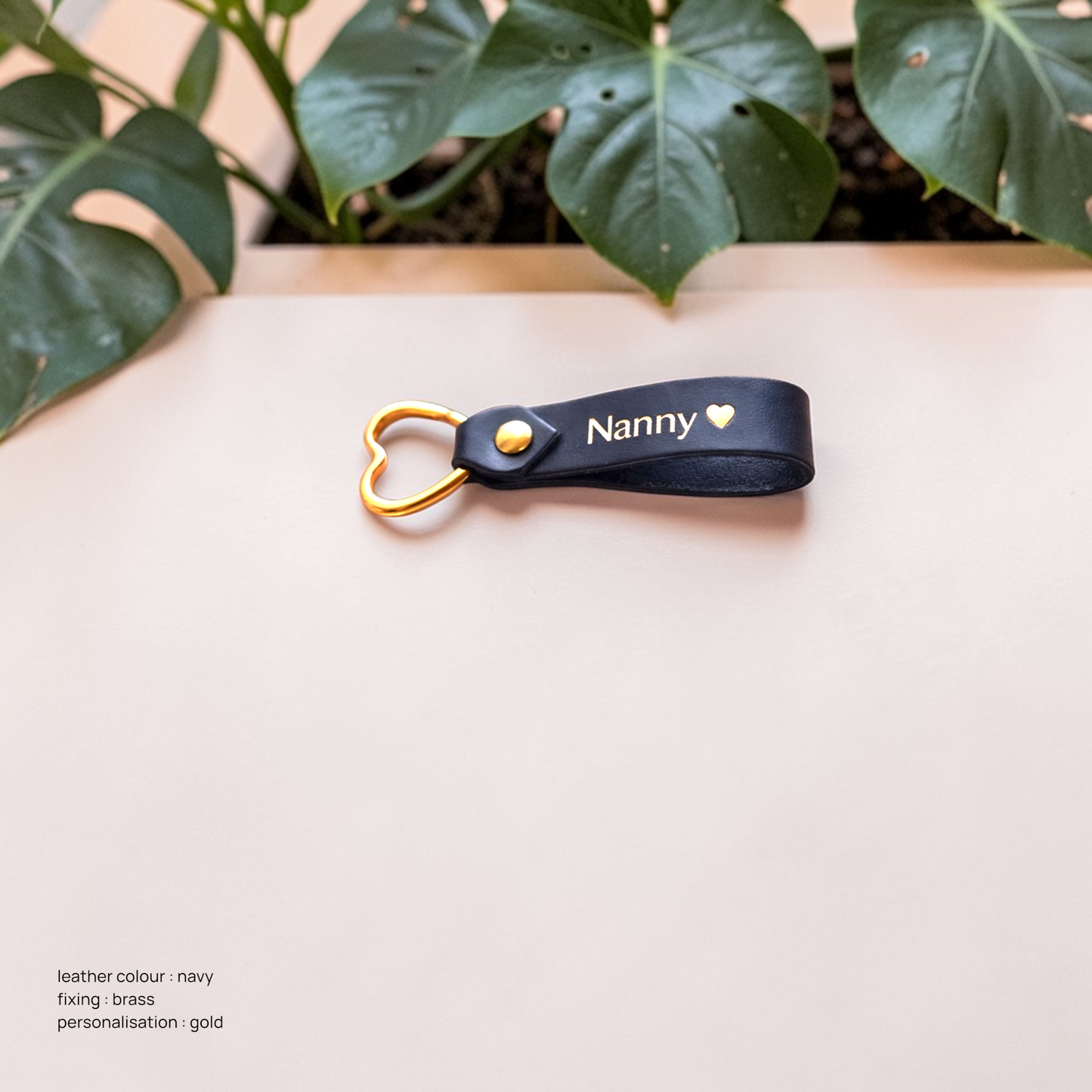 Handmade personalised leather keyring with engraved Nanny and heart